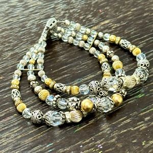 Stunning multi strand 925 beaded bracelet with gold and crystal details!